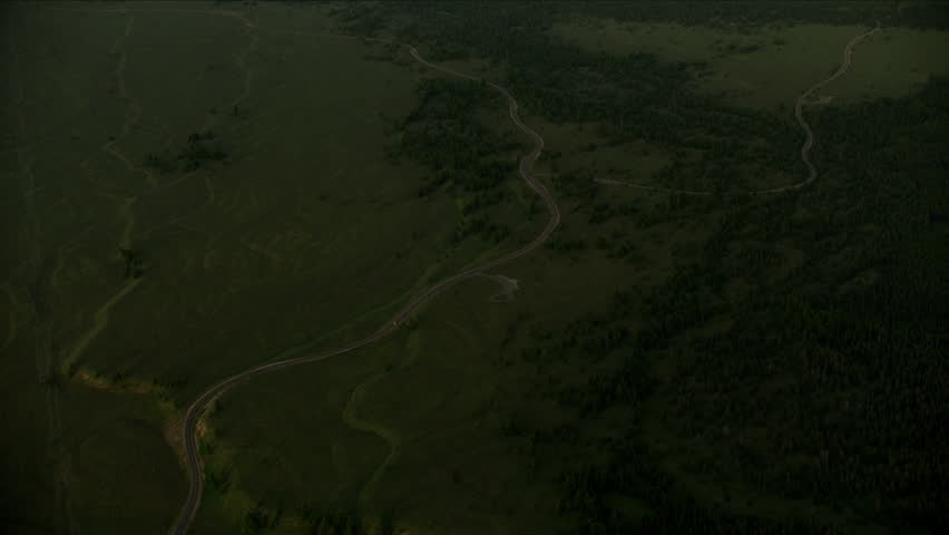 Aerial view of Jackson Lake at sunrise Grand Teton Range sunlight mountains Yellowstone National Park Wyoming Western USA RED WEAPON