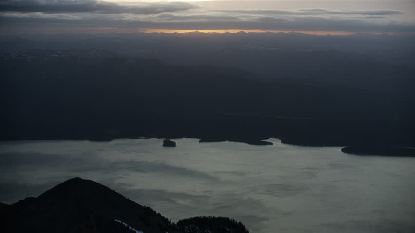 Aerial view at sunrise of the majestic Yellowstone National Park Jackson Lake Wyoming Teton wilderness mountain Range Rocky mountains Northern USA RED WEAPON
