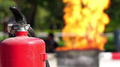 Chemical fire extinguisher fire burning in are severely footage slow motion