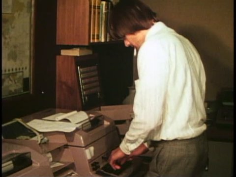 LONDON, ENGLAND, 1976, Currency trading room, Barclay's, teletype machine