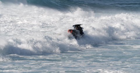 Emergency life guard jet ski crash in white water surf