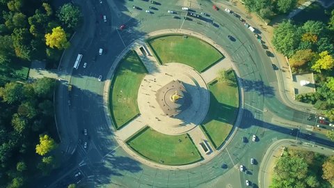 Aerial top down hyperlapse of Berlin Victory Column roundabout traffic