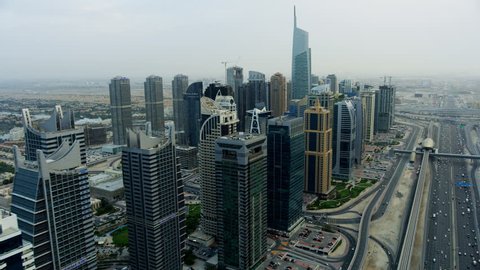 Dubai - March 2018: Aerial view Almas Tower skyscraper hotel resort Jumeirah Lake Towers marina United Arab Emirates Middle East Dubai RED WEAPON