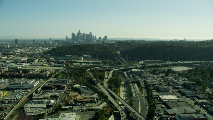 Aerial view of Glendale Junction US 110 and US5 Highway Los Angeles River downtown city skyscrapers business and Financial District California USA RED WEAPON