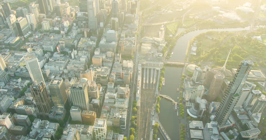 Aerial view at sunrise Melbourne central business district with Flinders Street Station and Yarra River Victoria Australia