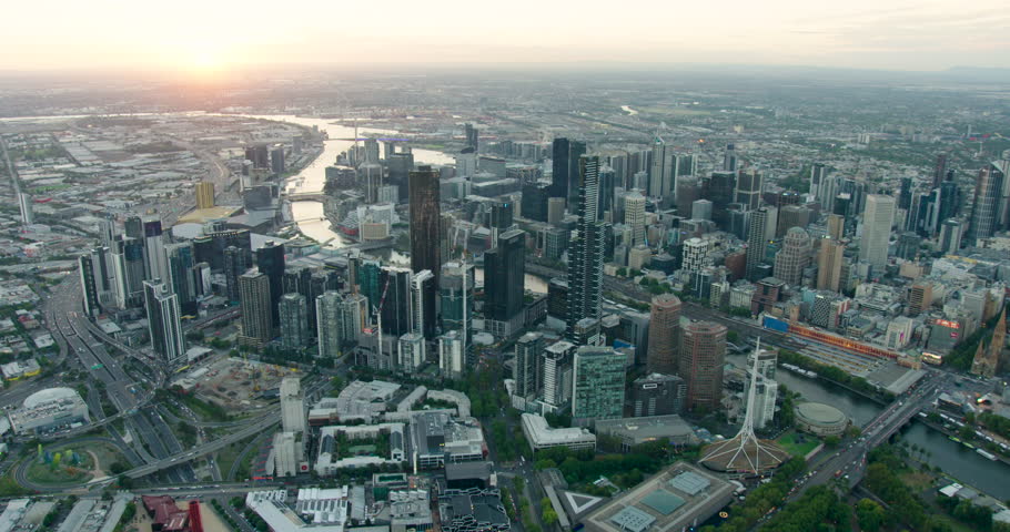 Aerial view Melbourne cityscape at sunset with Eureka Tower and Bolte Bridge Docklands Yarra River Victoria Australia