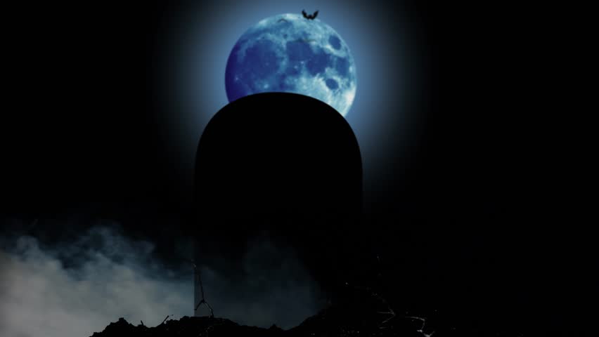 Human hand climbs out of the grave and behind it stands a monument and the blue moon. Black smoky background