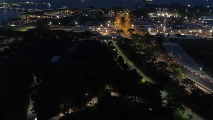 Singapore night Aerial Mooving to port. Shot. Commercial port of Singapore