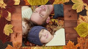 Digitally generated video of autumn leaves frame and screen showing family lying on autumn forest 4k