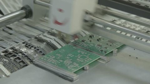 Tech. Production of electronic board. Close-up.