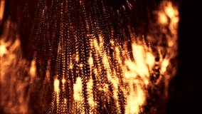 3d abstract looped background with glow particles like Christmas or New Year garland or sparks that form wiggle structures with depth of field, bokeh, light effects. Seamless footage. Golden 14
