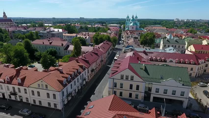 Aerial view of Grodno, Belarus. The historic city center with red tile roofs in perspective. | Shutterstock HD Video #1018491736