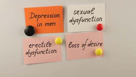 Man explains link between depression in men and sexual dysfunction on a whiteboard