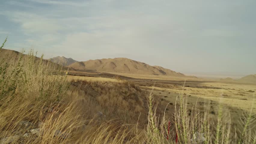 Panning shot of the beautiful Organ Mountains in Las Cruces, New Mexico during the daytime