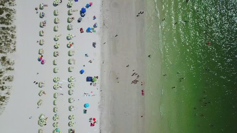 Aerial View Panning Along Clearwater Beach & Ocean