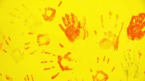 Children's hand prints on the wall. Little artists. Multicolored hands. Children's entertainment and creativity. Games in the company of friends. Happy childhood - Powered by Shutterstock - Get 15% off with code: PIKWIZARD15