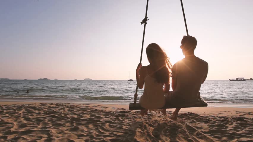 Happy honeymoon getaway holidays, romantic couple on the beach, vacation travel.