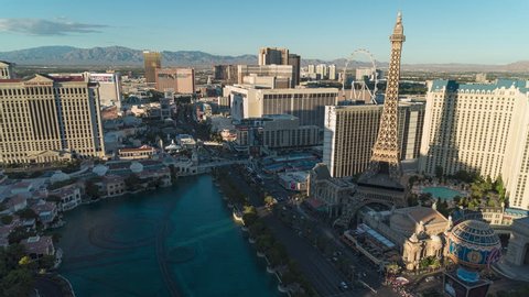 Las Vegas, Nevada USA Oct 22, 2018  An aerial time lapse video from day to night view of the Las Vegas Strip with the ferris wheel and and Paris's eiffel tower overlooking the Bellagio fountains.