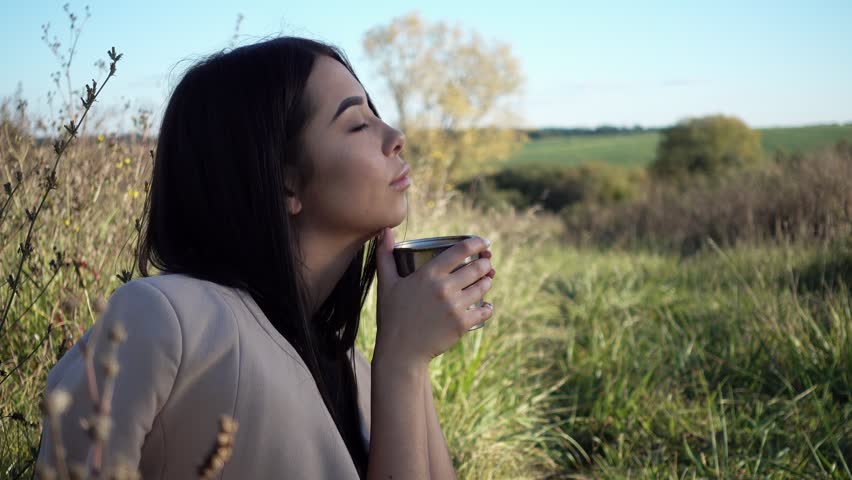 Girl Tea in Nature Video (100% Royalty-free) 1018531132 | Shutterstock