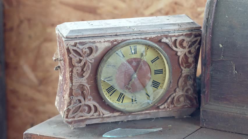Old abandoned garage with a bunch of junk from the past era, antiques of the 20th century, old appliances, old clock bright room
