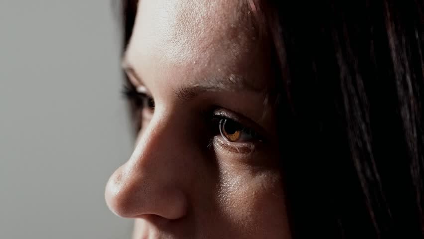 Close-up of a woman's face, a woman at a psychologist's reception, she shares the secrets of her personal life, maybe she was raped and she asks for the help of a specialist, anxiety in her eyes Royalty-Free Stock Footage #1018538863