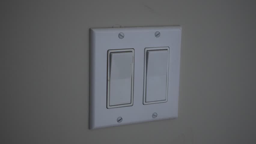 4K Mans Hand Turning On Second Light Switch In Double Switch Royalty-Free Stock Footage #1018547668