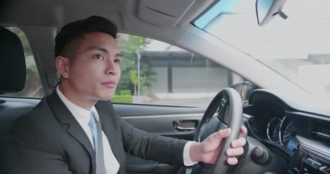 business man driving and gets lost in the car