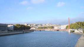 Lyon, France. October 25th, 2018. Footage of the Saone, one of the river passing thru the city. Video taken in autumn with a nice sky (blue with few clouds)