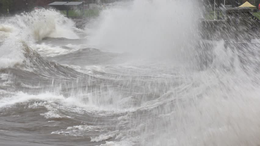 Massive waves hit seawall at city during severe storm

