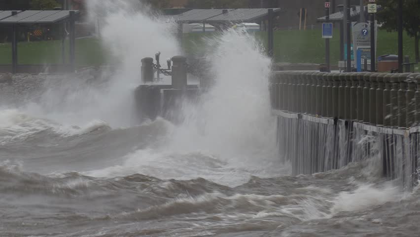 Massive waves hit seawall at city during severe storm
