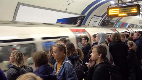 London, England-1 October,2018: The Underground or The Tube inside view of London underground in rush hours. Overcrowded trains in the central city.