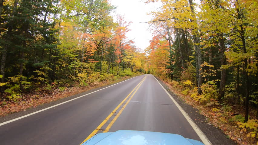 scenic fall colors along winding road in Copper Harbor Michigan