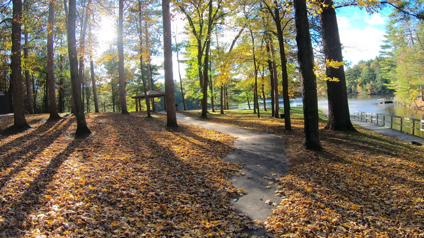 Walking up to colorful fall picnic spot at Mirror Lake State Park Wisconsin