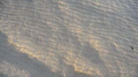 waves slowly splashing on the sand