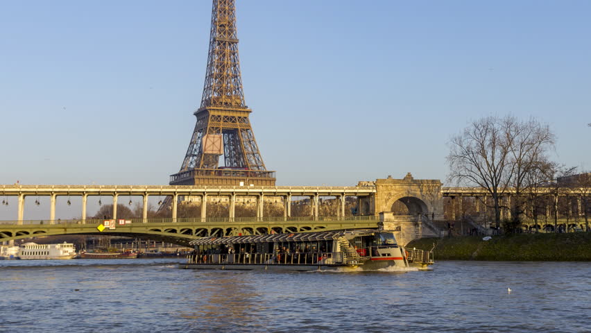4k Timelapse of Metro crossing Bir-Hakem bridge with Eiffel Tower in background - Paris, France | Shutterstock HD Video #1018593136