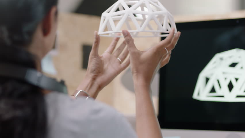 Creative business woman engineers design geodesic dome 3d printing model indian woman showing colleague ideas in modern startup office successful team sharing development project