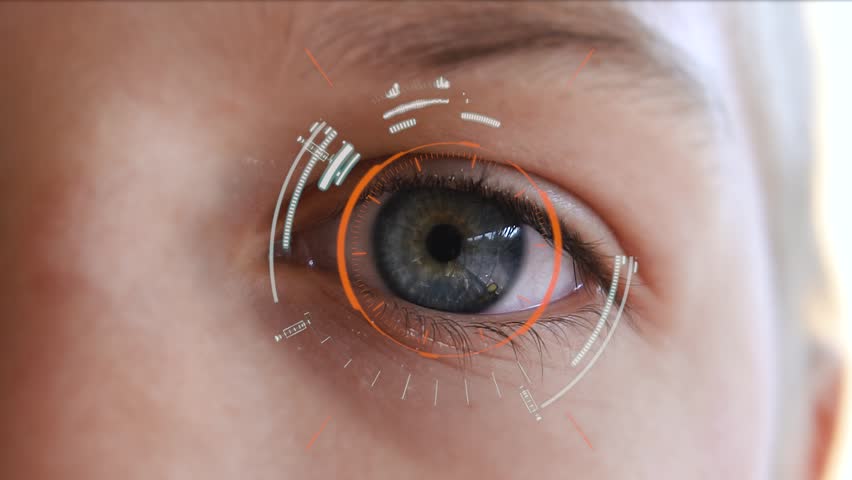 Close up to child eyeball with futuristic targeting system.  | Shutterstock HD Video #1018598542