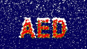 New Year text ISO code currency AED. Snow falls. Christmas mood, looped video. Alpha channel Premultiplied
