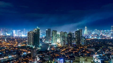 METRO MANILA, PHILIPPINES - CIRCA MARCH 2018: Ttime-lapse view on the Skyline of the city circa March, 2018 in Metro Manila, Philippines.

