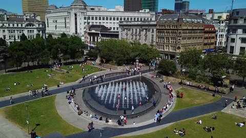 Piccadilly gardens, Manchester, United Kingdom - June 23th 2018: Aerial view of Manchester, people enjoying a summertime lunchtime in Piccadilly gardens, Manchester. 