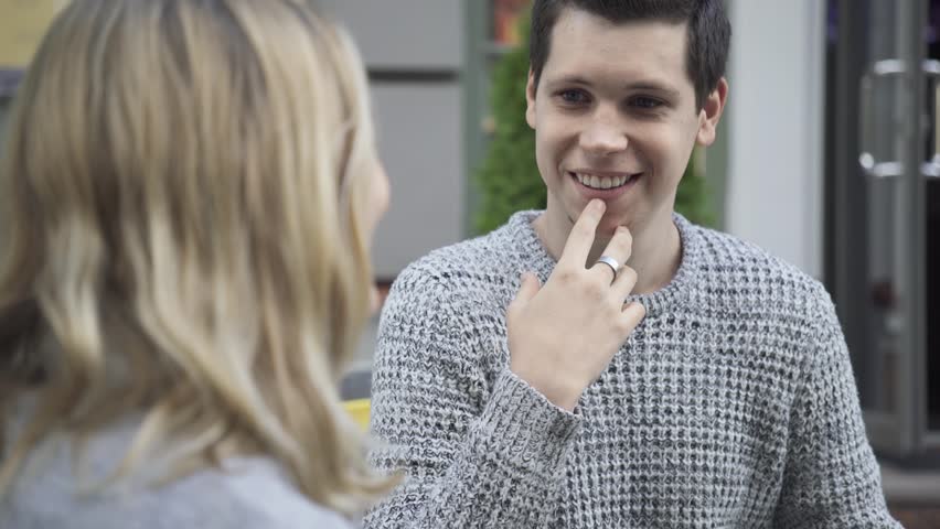 Young couple chatting in a cafe.