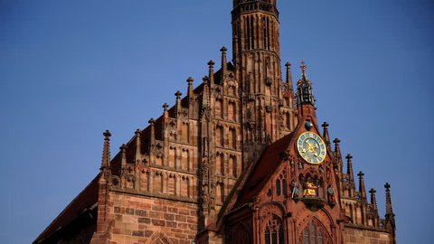 NUREMBERG, GERMANY - MAY 10, 2009 Time Lapse of Nuremberg Church Building Clock Tower Famous German Landmark Day