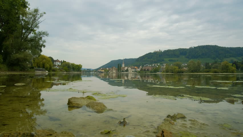 The beautiful Rhine river with reflections of the medieval town of Stein am Rhein in the background. Stein am Rhein is a small town located west of Lake Constance in Switzerland.