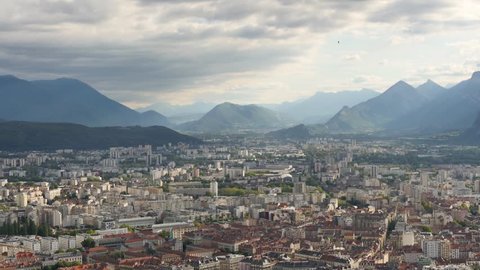 Time lapse in Grenoble, in the Isère region, France. Landscape of the city, seen from the fort of the bastille. Cloudy weather.