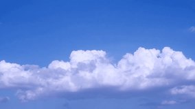 Blue clear sky in horizon, white rolling building clouds time lapse, fluffy, puffy cloudscape, aerial view panoramic view.