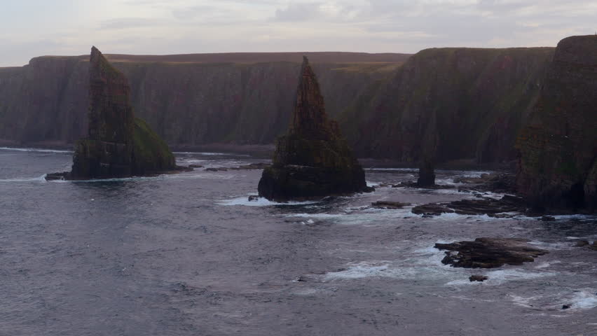Duncansby Stacks at dusk, rock pinnacles to the immediate south of Duncansby Head, Scotland