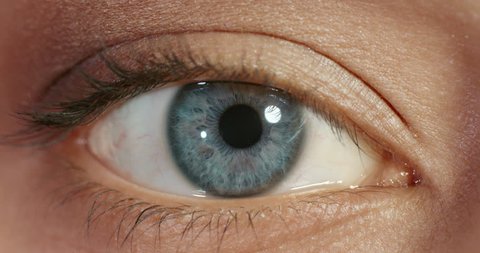 close up macro blue eye opening beautiful iris natural human beauty healthy eyesight concept