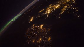 Rotating Planet Earth with aurora and star galaxy, as seen from the International Space Station. Time Lapse 4K. Images courtesy of NASA Johnson Space Center. Rotate right 