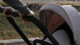 Baby in outdoor walk with mother 4K video