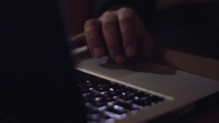 guy working at night on his computer